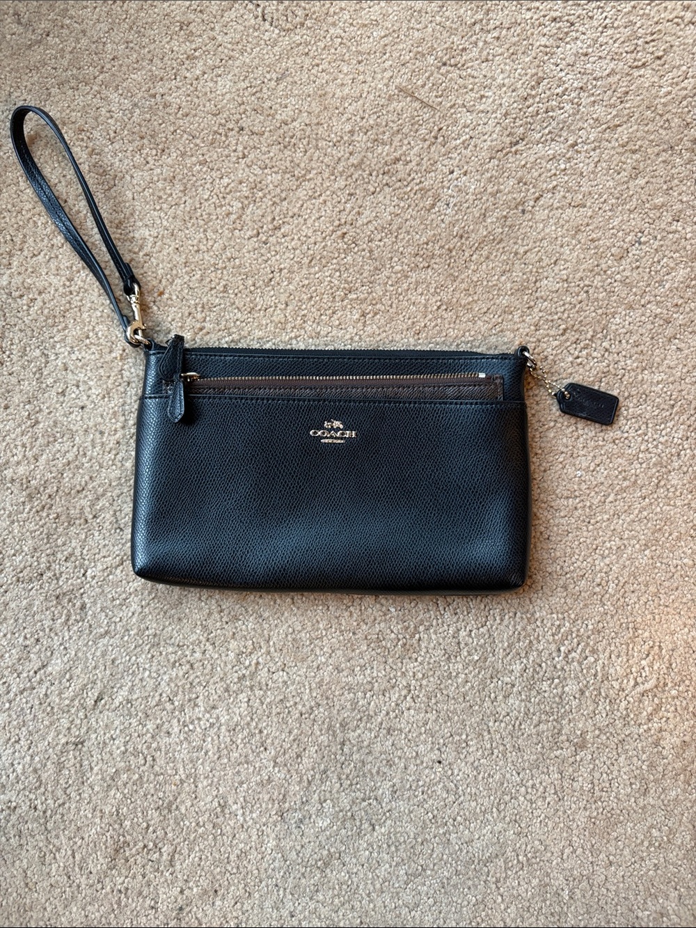 Coach Black Pebbled Leather Wristlet with Gold Hardware and thin wallet.